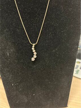 Gold Tone Curved Journey 7 Graduated Stone Necklace